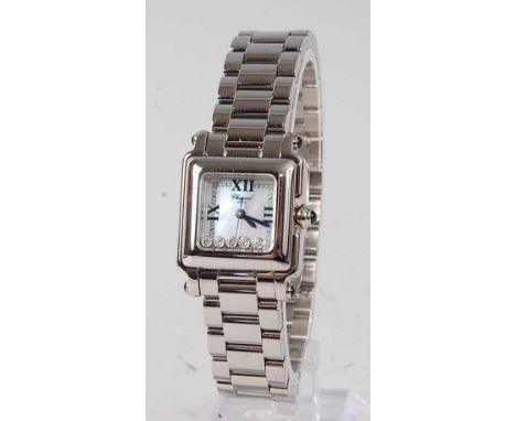 A lady's Chopard Happy Sport stainless steel bracelet watch, having signed mother of pearl dial with five floating diamonds, 