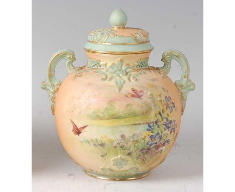 A Royal Worcester blushware pot pourri vase and cover, decorated with wildflowers and insects in a landscape to a shaded blus