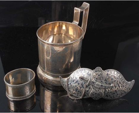A Russian silver mug, bright cut engraved with horse and chariot scene, 141g, with 84 zolotnik mark, St Petersburg 1895, make