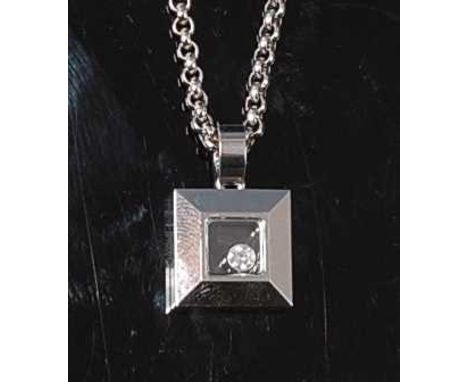 An 18ct white gold Happy Diamond pendant by Chopard, the pendant comprising a 10mm square with a 2.2mm floating round brillia