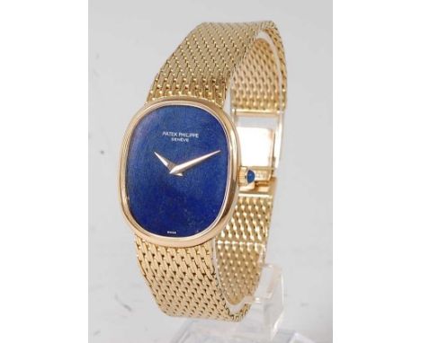 A Patek Philippe 18ct gold 'Golden Ellipse' gents wristwatch, having a signed blue dial, manual wind movement, and original g