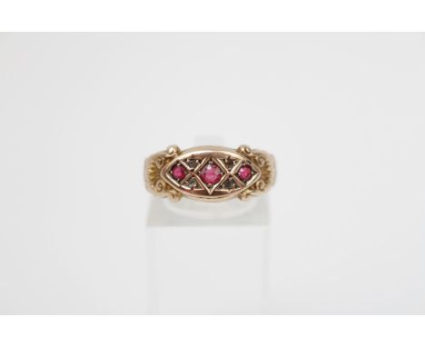 Edwardian 9ct Gold Ruby set ring of carved design. Size Q. 2g total weight 