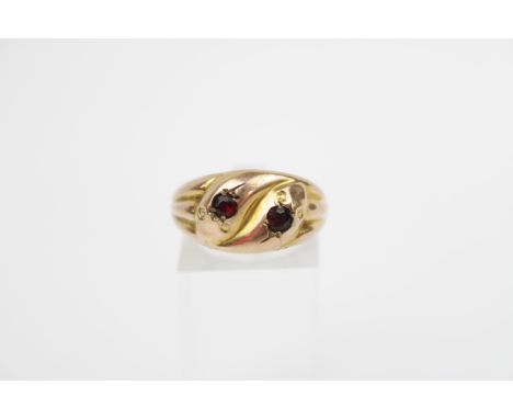 Edwardian 9ct Gold 2 stone Ruby set ring of carved design. Size R. 2g total weight 