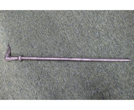 Indonesian White metal walking stick with Elephant head handle and foliate tapering stem. 90cm in Length 