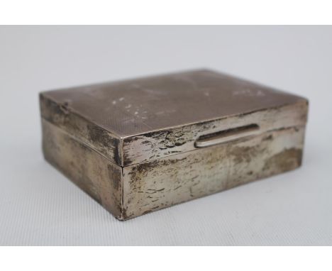 A Silver cigarette box engine turned decoration with Cedar lining, Birmingham 1939 by Turner &amp; Simpson Ltd. 11cm in Width