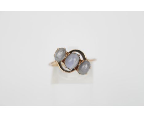 Ladies 9ct Gold three stone cabochon Moonstone set cross over ring. Size R. 4g total weight 