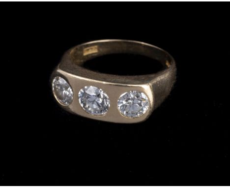 * Ring. An 18ct gold ring set with 3 brilliant cuts diamonds, each approximately 0.25 carats each with inclusions, size K, ov