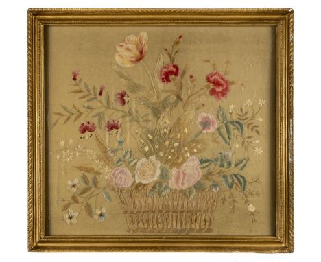 * Embroidered picture. A basket of flowers, English, early 19th century, woolwork picture, depicting a basket containing a va