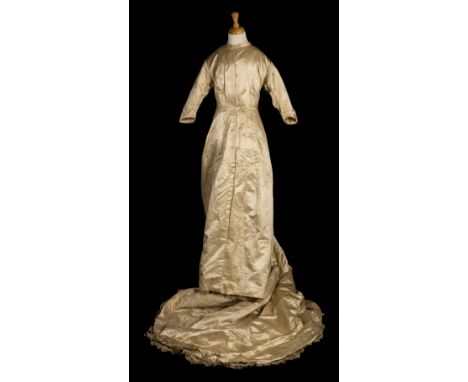 * Dress. A satin wedding dress, circa 1890, cream satin gown, hand-made (machine and hand-stitched), partly boned and fitted 