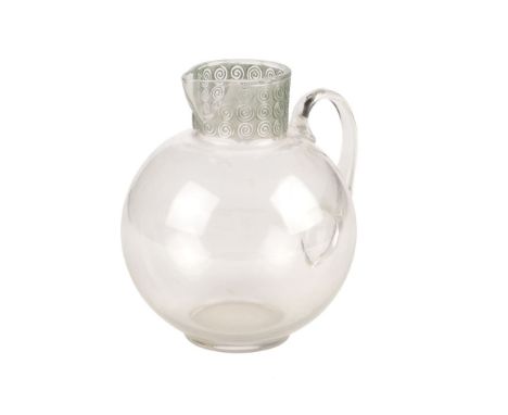* Lalique (Rene, 1860-1945). An early 20th century glass lemonade jug, of ovoid form the neck with stylised swirls on a green