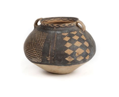 * Funerary pot. A Chinese Neolithic earthenware funerary pot, circa 2000 BC, the ovoid two handle pot painted with a lattice 