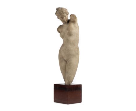 * A Hellenistic Marble Figure of Aphrodite, circa 2nd century B.C., three-quarter length carved white marble, some age discol