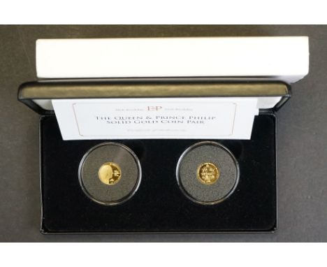A Jubilee Mint commemorative 90th and 95th birthday of the Queen &amp; Prince Philip solid 9ct gold two coin set, complete wi