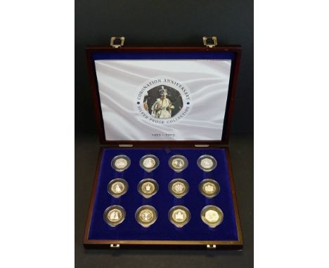 A Royal Mint Queen Elizabeth II 1953-2003 coronation anniversary silver proof 50p coin collection, contains twelve silver pro