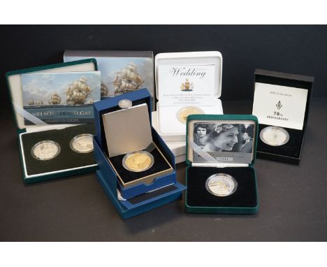 A collection of four Royal Mint United Kingdom silver proof coins to include 2006 Queen Elizabeth II 80th Birthday Piedfort c