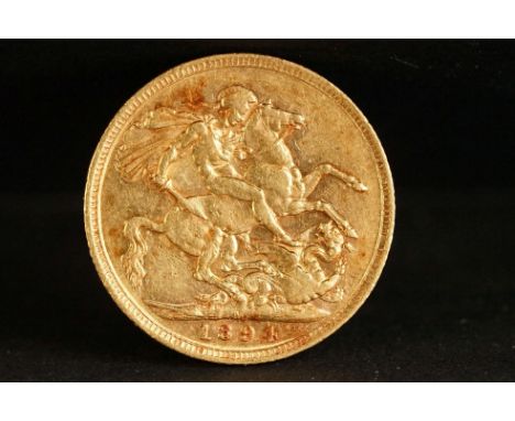 A United Kingdom Queen Victoria gold full sovereign coin dated 1894 with Melbourne mint mark. 