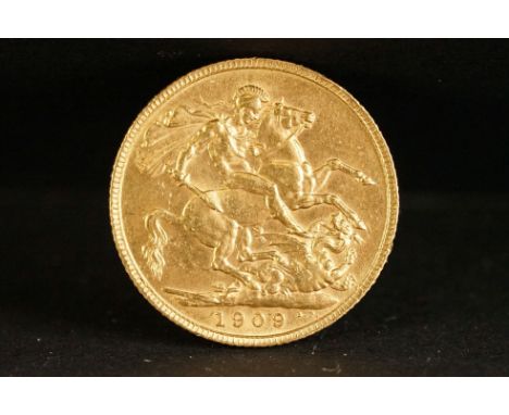 A United Kingdom King Edward VII gold full sovereign coin dated 1909. 