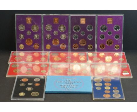 A collection of thirteen United Kingdom coin sets to include 1977, 1970, 2013 and 1967 examples.