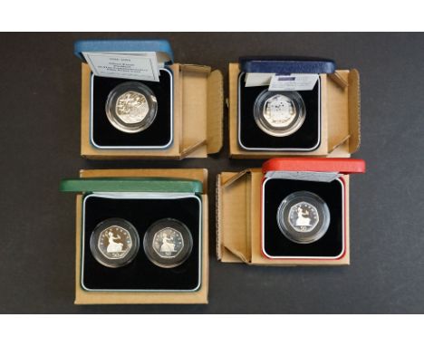 A collection of four Royal Mint United Kingdom silver proof 50p  / fifty pence coins to include 1992-1993 Commemorative, 1997