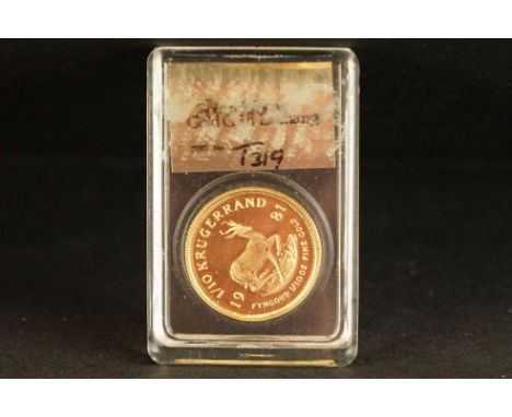 A slab mounted South Africa gold 1/10th Oz Krugerrand coin dated 1981 