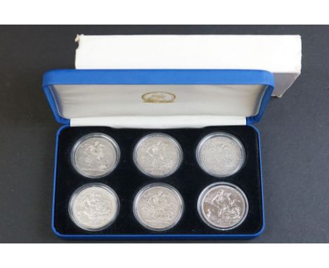 A cased set of five British pre decimal silver crown coins to include 1821 King George IIII, 1897 Queen Victoria, 1889 Queen 