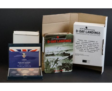 A Royal Mint 2004 60th Anniversary of the D-Day Landings commemorative silver proof three coin &amp; medal set, complete with