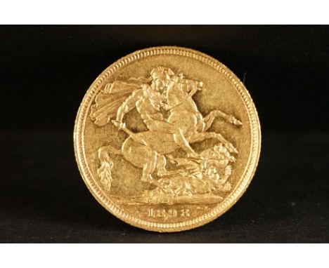 A United Kingdom Queen Victoria gold full sovereign coin dated 1898 with Sydney mint mark. 