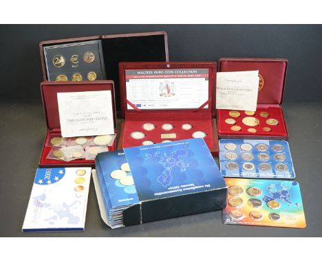 A collection of Euro coin sets to include Germany 2003, Austria 2008, Spain 2003, Malta 2008, Euro collectors edition and two