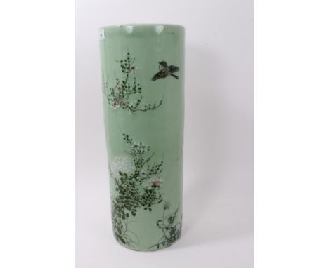 Late 19th / early 20th century Chinese celadon stick stand of cylindrical form, with painted floral decoration, 56cm high