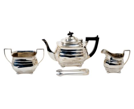 1920s three piece silver tea set - comprising teapot of compressed baluster form, with faceted panels, angular ebony handle a
