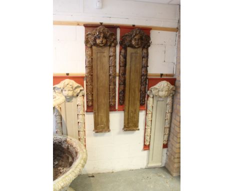 Set of four early 20th century painted plaster architectural panels in the baroque style, pilaster form with cherub surmount 