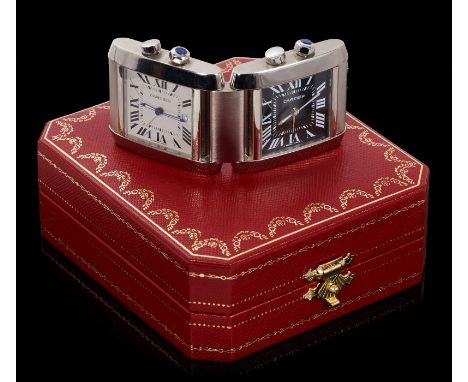 Cartier dual time travel alarm clock, the two alarm clocks joined with a central hinge, the left hand clock with white dial, 