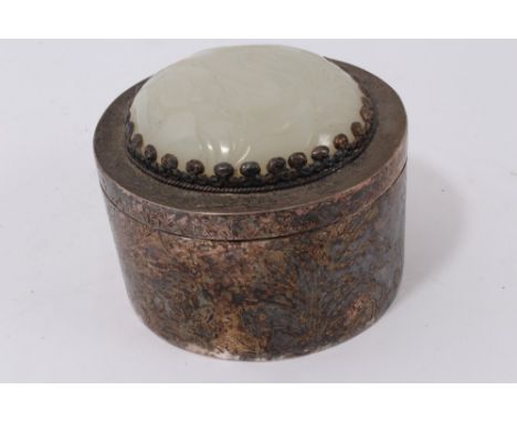 Chinese white metal and jade mounted box of cylindrical form, the cover mounted with oval convex pale jade plaque carved in l
