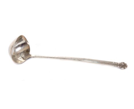 1920s Omar Ramsden silver sauce ladle with oval bowl and hand-finished stem with floral terminal, 17cm overall length