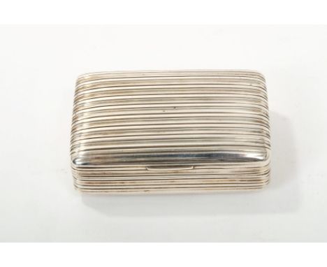 Early George IV silver snuff box of rectangular form, with rubbed decoration, hinged cover with silver gilt interior and engr