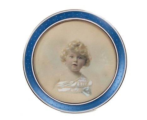 Fine quality early 20th century Continental silver photograph frame of circular form, with blue guilloche enamel surround and