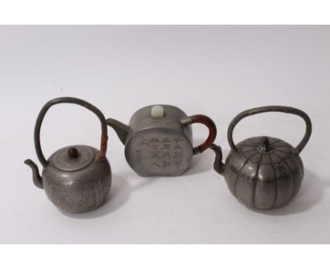 19th century Chinese pewter teapot of squat form the cover with jade knop, engraved with a landscape to front face and script