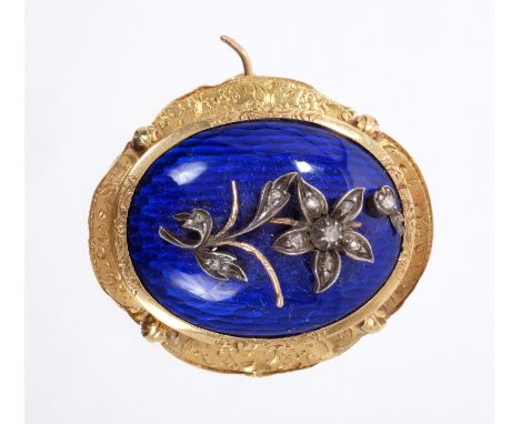 Victorian diamond and blue enamel brooch, the oval panel with a diamond set flower on blue guilloche enamel ground in engrave