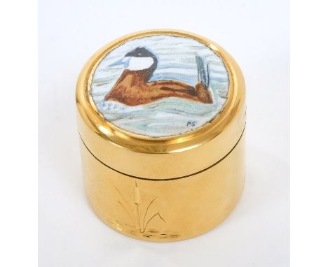 Contemporary limited edition silver gilt pill box with engraved bulrush decoration and slip-on cover with inset enamel panel 