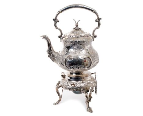 Late Victorian silver spirit kettle of baluster form, with embossed scroll and floral decoration, bird-head spout, silver han