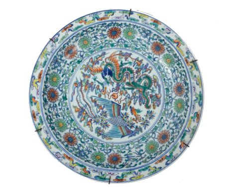Chinese Qing period Doucai charger, probably 19th century, with polychrome painted five-toed dragon and with pearl and phoeni