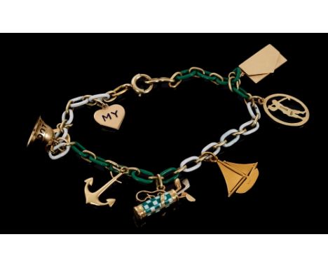 Good quality 14ct gold and enamel charm bracelet with green and white enamel links and charms. The charms to include personal