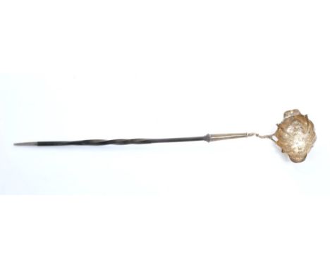 George II silver toddy ladle with shaped floral decorated bowl and twisted whalebone handle (London 1756), maker's mark rubbe