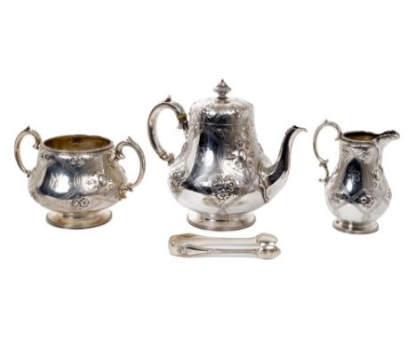 Victorian three piece silver tea set - comprising teapot of baluster form, with engraved monogram and panels of Gothic-style 