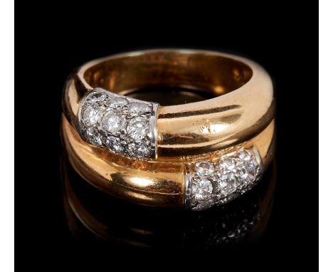 Cartier diamond and gold crossover ring composed of two tubular yellow gold rings, set with twenty four brilliant cut diamond