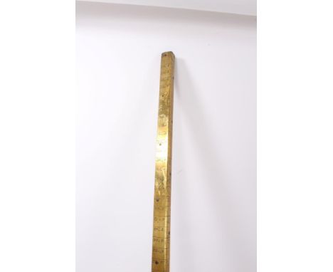 Unusual 19th century brass bound measuring stick with two engraved scales, 106cm long