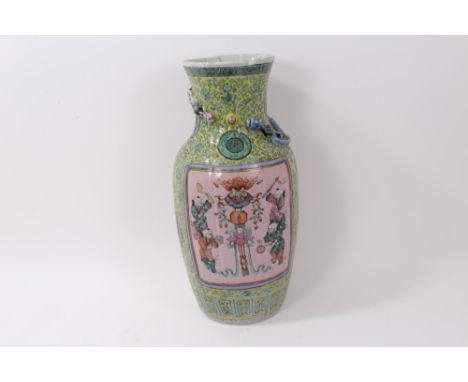 Late 19th century Chinese export famille rose vase with folded handkerchief collar, applied dragons, painted musician and pre