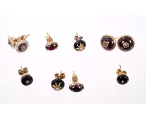Group of earrings to include a pair of diamond and guilloche enamel earrings, pair cabochon garnet earrings and three other p