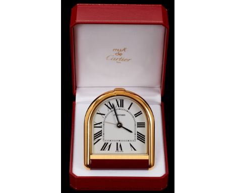 Cartier Must de Cartier travel alarm clock with alarm mechanism, quartz movement and arched dial in gilt metal and red enamel
