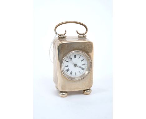 George V silver miniature travelling clock with French movement, lever escapement and white enamel dial with Roman numerals i